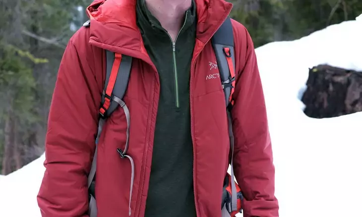 A man wearing a synthetic jacket