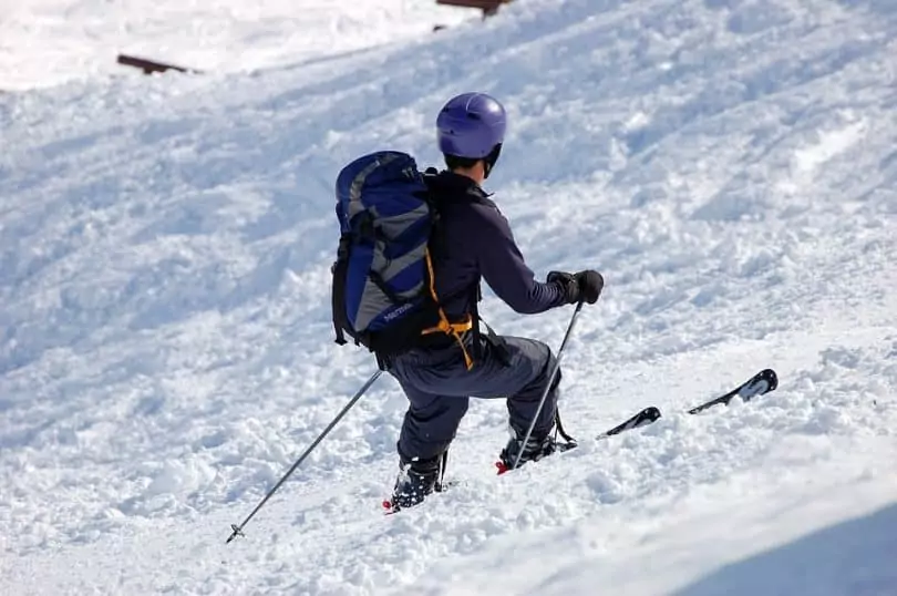 a man skiing on a gorgeous day