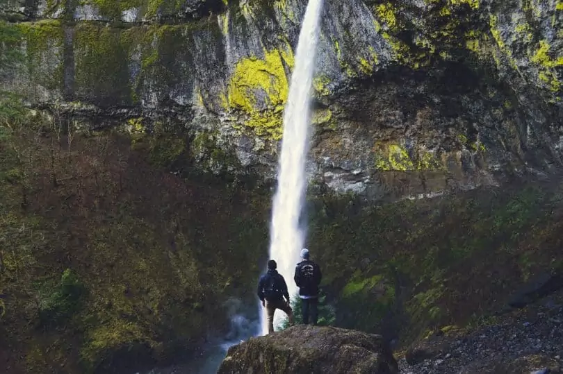 2 Men's Watching Water Falls during Daytime