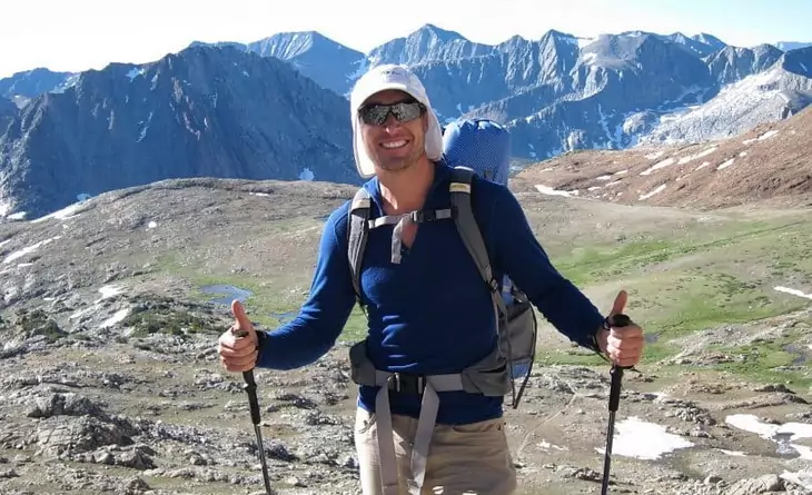 A man hiking at the Atop-Forester-Pass