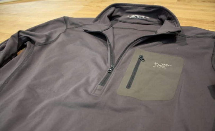 a-picture-of-Arcteryx-RHO-AR-base-layer-on-the-ground