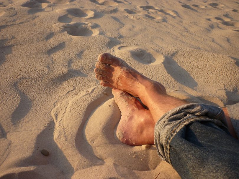 barefoot walking on the beach