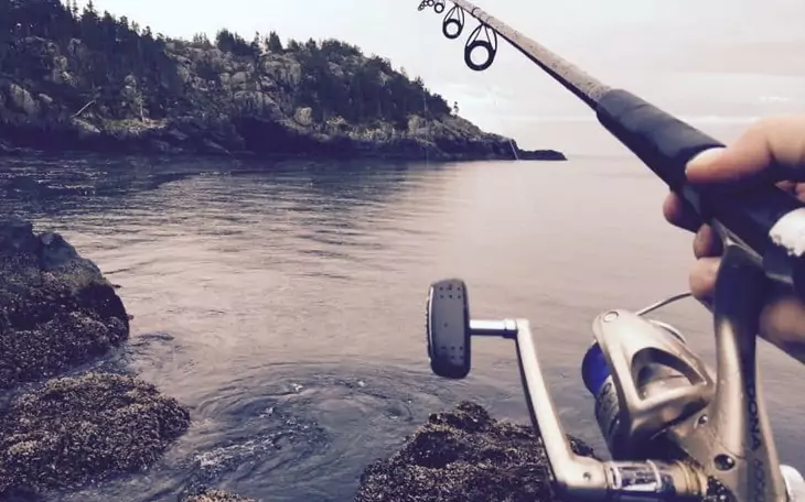 A lake viewed from a fishing rod side