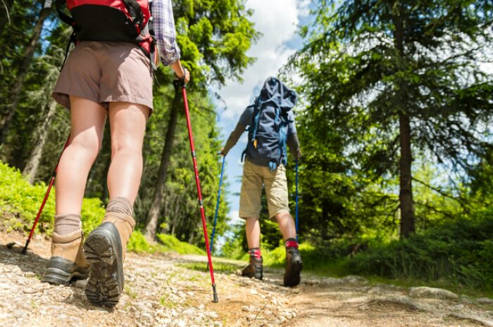 two people hiking in the mountains