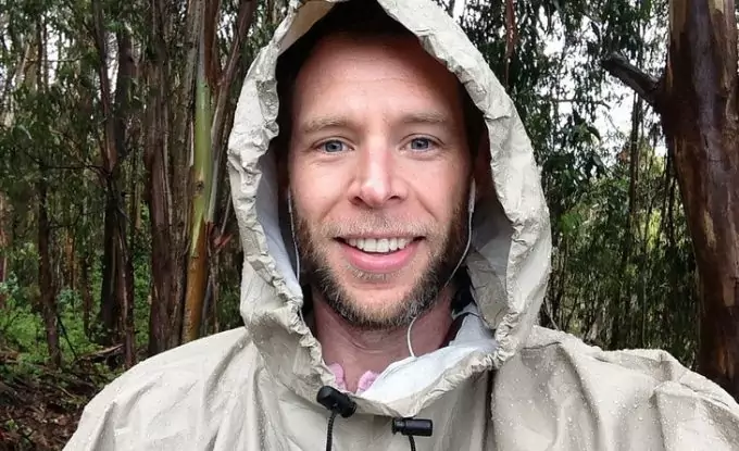 Image showing a man wearing a waterproof poncho