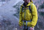 A man wearing versatile jackets for hiking and everyday use to ultralight emergency shells