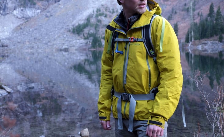 A man wearing versatile jackets for hiking and everyday use to ultralight emergency shells