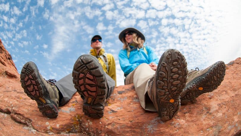 hikers-relaxing-on-the-rock