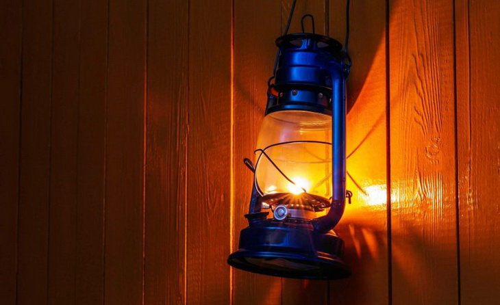 Image showing a gas latern hanging in a house tree
