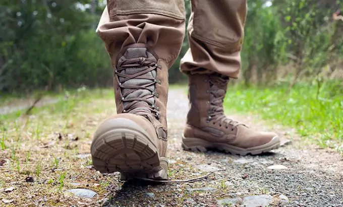A man walking in a pair of jungle boots