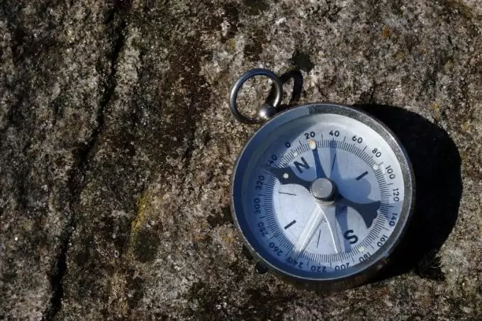 Image showing a hiking-compass-on-wood