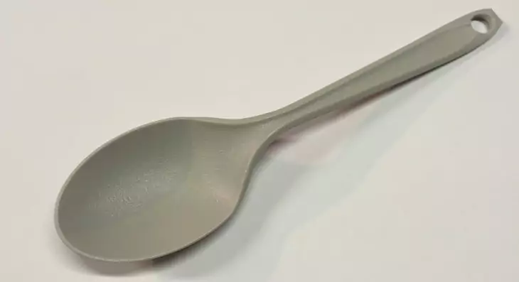 Lexan Spoon By Coghlans on the table