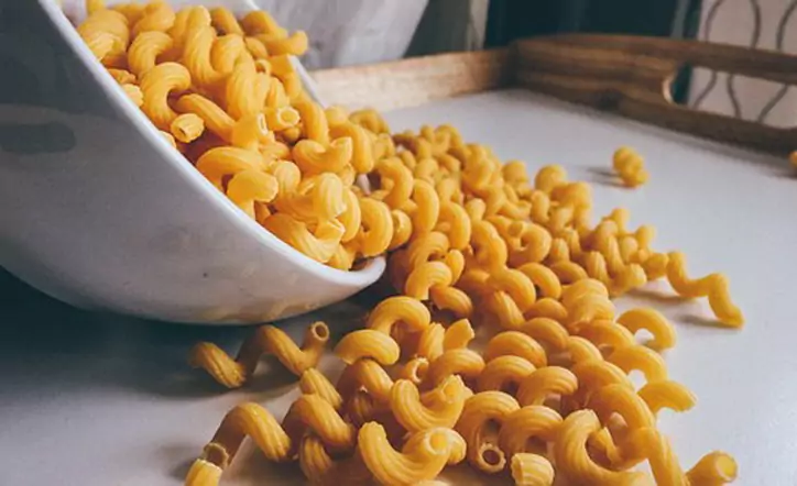 A Picture Showing a Bowl of Macaroni on the side