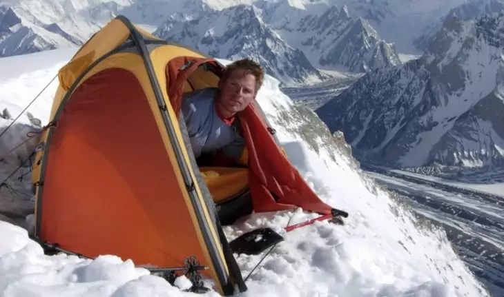 Man in a Polaris mountaineering tent