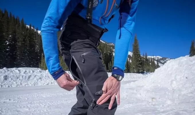 Man wearing a pair of Outdoor-Research-Skyward-pant with vent