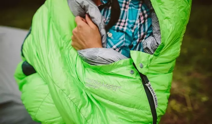 A poerson in a sleeping bag