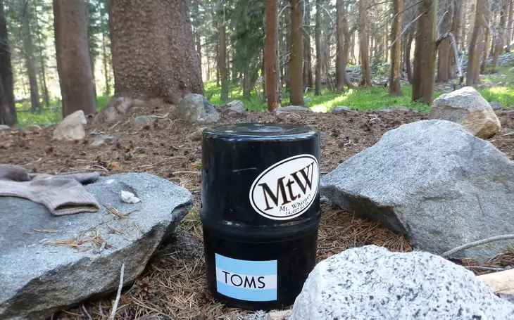 bear canister for animal-proofing campsite