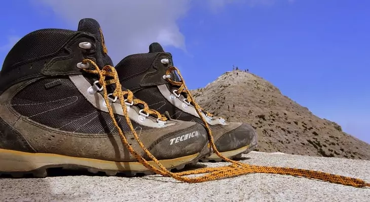 Image showing a pair of hiking boots in from of a pyramid