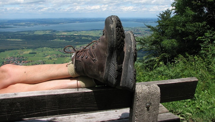 Image showing a person's legs while is wearing a pair of hiking boots