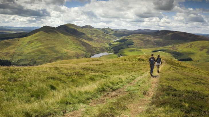 couple-walking-downhill