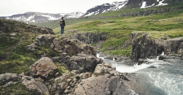 backpacker in the middle of the landscape