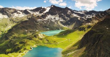 Mountains Under Cloudy Sky during Daytime
