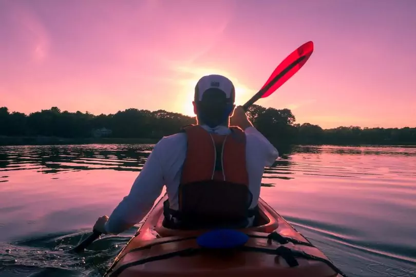 picture of a person kayaking during daylight