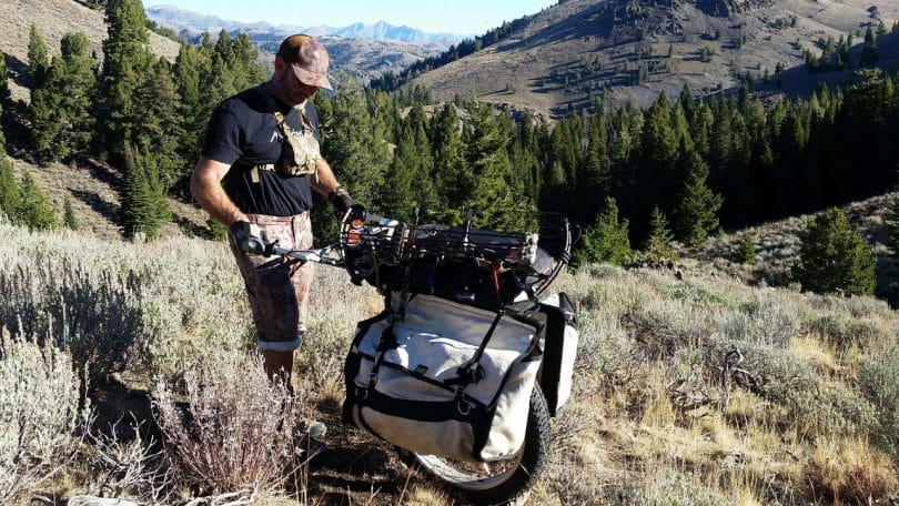 man carry Backpacking Cart