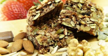 close-up picture of nut bars and dried figs