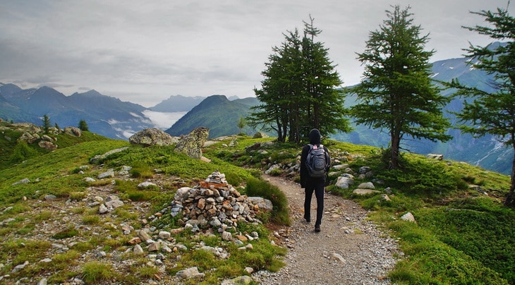 Person in Black Backpack Walking