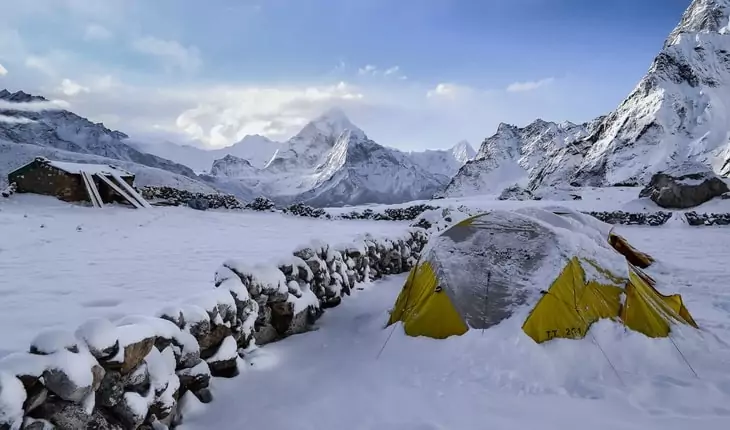 Winter camping in mountains