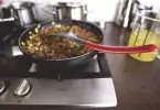 Dish Cooking on Black Non Stick Pan on a Burner