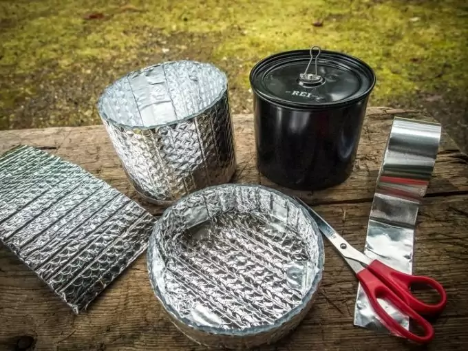 camping cooking gear on table
