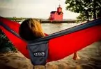 Woman relaxing in a ENO Eagles Nest Outfitters - DoubleNest Hammock