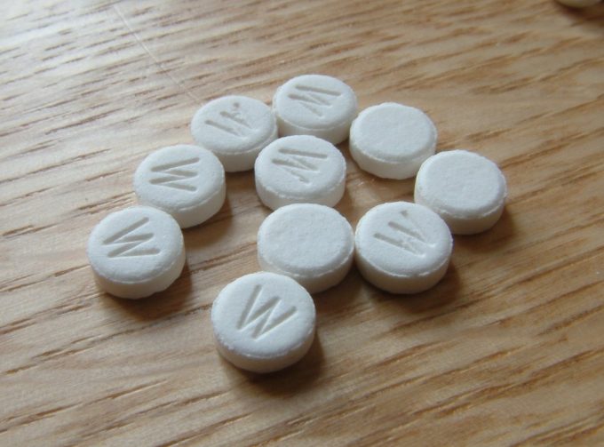 antihistamines on a wooden table