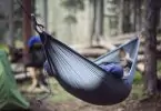 A person relaxing in the Grand Trunk Nano Hammock