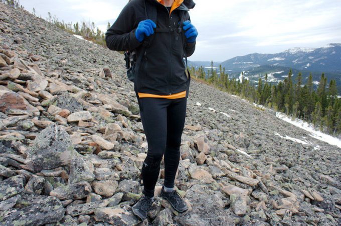 A oerson hiking in tights