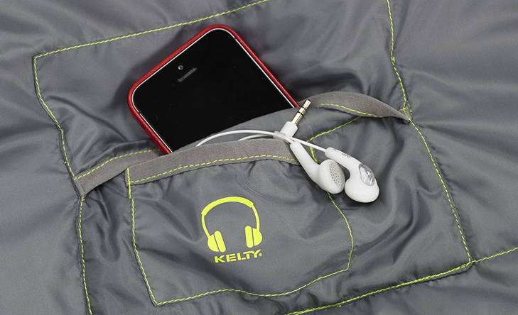 A smartphone in the Kelty Tuck's pocket