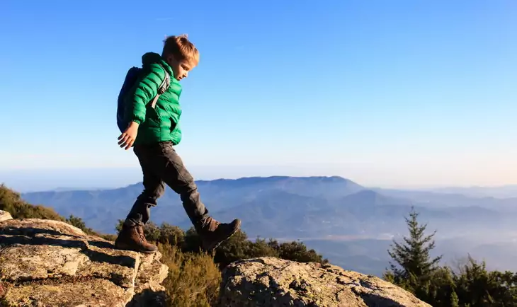 Little kid hiking in the backcountry