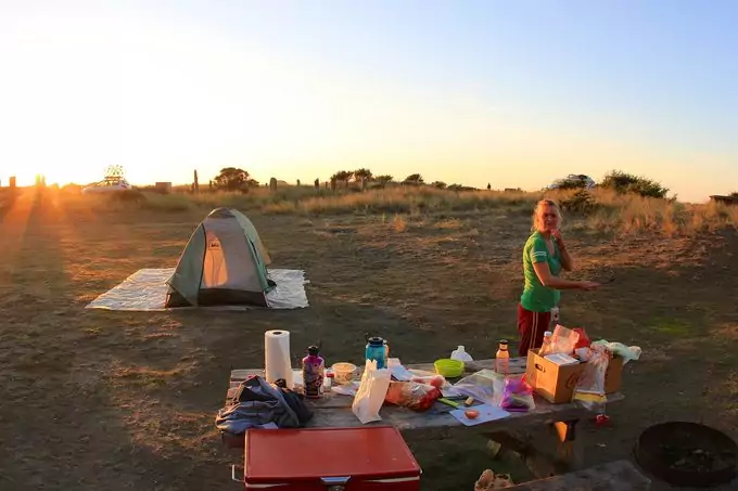 A woman camping at Prairie Creek Campground