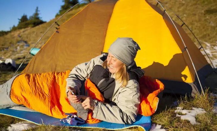 Woman camping in summer