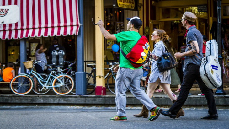 travelers walking down the street