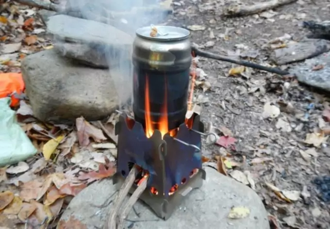 brewing-coffee-on-emberlit-stove-