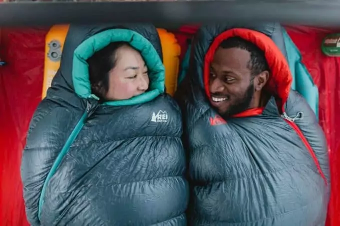 couple-in-synthetic-sleeping-bag