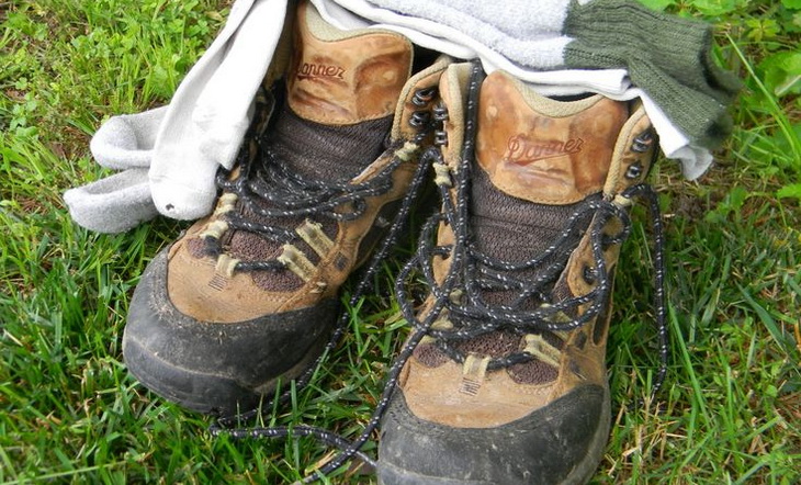 Take off your socks and wear your boots with bare feet.