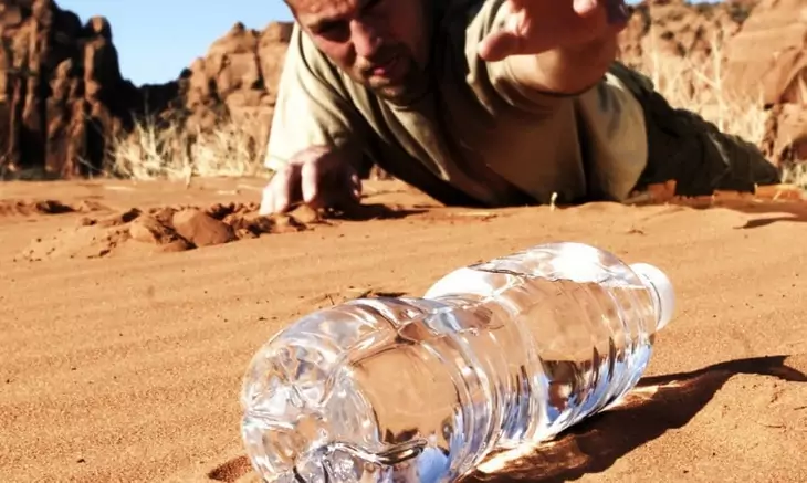 dehydrated person laying on the ground