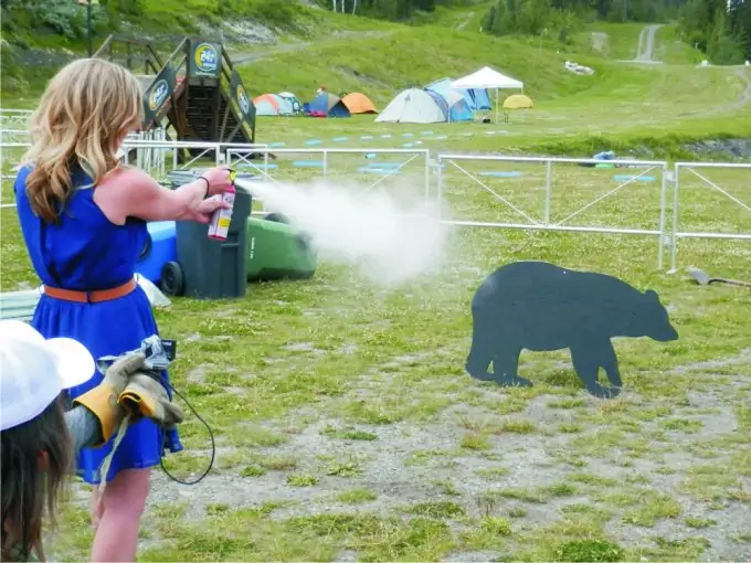 girls-repelling-bear-spray