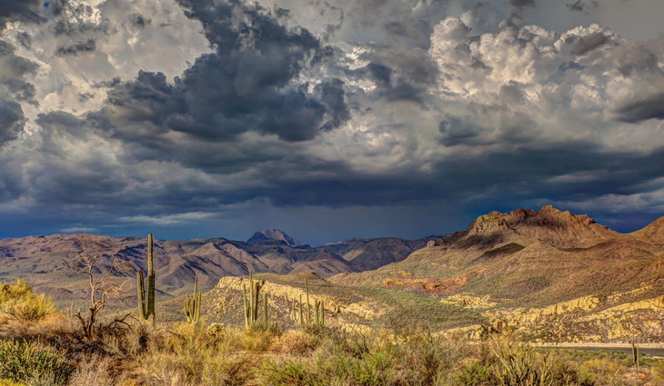 Brown Mountains Under Black Clouds