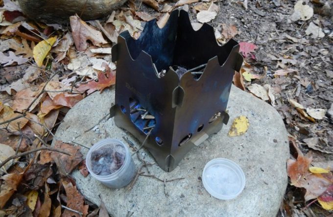 preparing-to-start-a-fire-emberlit-stove-