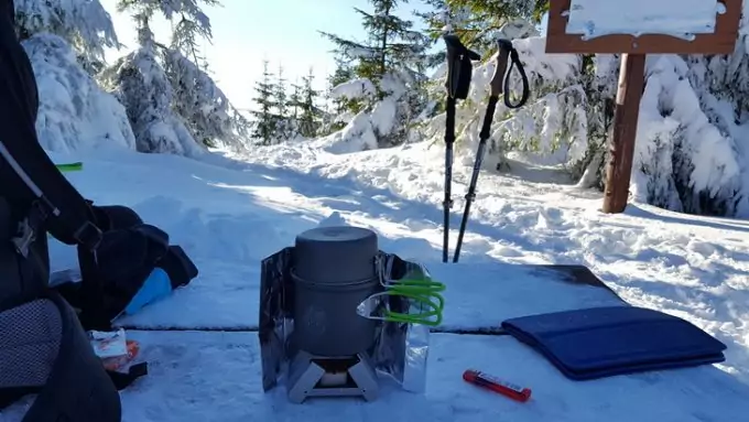 Preparing food while hiking in the winter